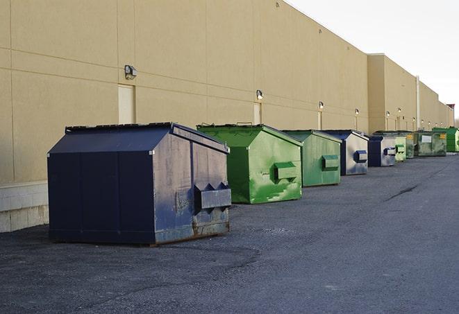 a row of heavy-duty dumpsters ready for use at a construction project in Crimora VA